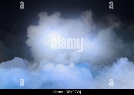 Billowing cumulus clouds are filling high-altitude flat design sky, with illuminated central mass Stock Photo