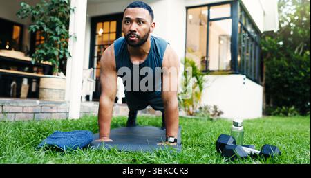Health, push up and training with man outdoor for workout, balance and challenge. Abs exercise, fitness and bodybuilder with person in backyard of Stock Photo