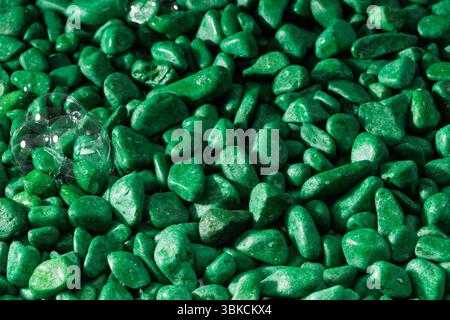 Green pebbles background. Green pebbles background texture. Stock Photo