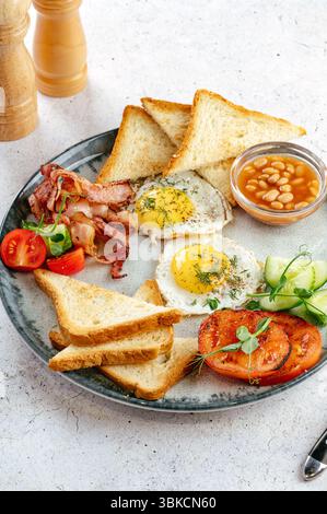 English breakfast with toast in a cafe Stock Photo