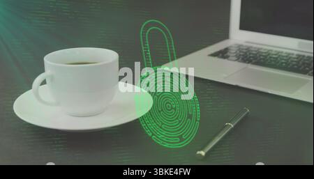 Hovering green holographic padlock icon above office desk, with white coffee cup, laptop and pen Stock Photo