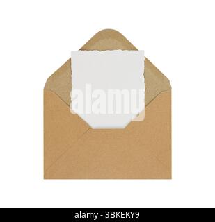 Brown kraft paper envelope with a blank white card inside, isolated on white background. Minimalist and natural look suitable for invitations, greetin Stock Photo