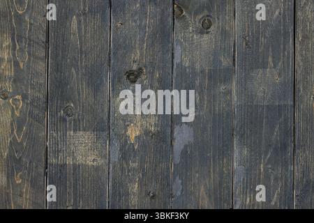 old dark painted wooden wall background Stock Photo