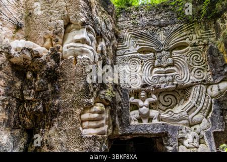 The Lapidales sculptures are carved into the rock of a former quarry by various artists and depict different figures and scenes. The works of art are part of the landscape and blend harmoniously into the natural surroundings. They are an example of the art and history of the region. Port-d'Envaux, Nouvelle-Aquitaine, France Stock Photo
