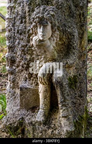 The Lapidales sculptures are carved into the rock of a former quarry by various artists and depict different figures and scenes. The works of art are part of the landscape and blend harmoniously into the natural surroundings. They are an example of the art and history of the region. Port-d'Envaux, Nouvelle-Aquitaine, France Stock Photo