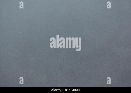 Grey textured surface is filling flat design frame while showing subtle grainy details Stock Photo