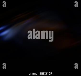Abstract flat design showing flowing blue, purple and orange light streaks over black background Stock Photo