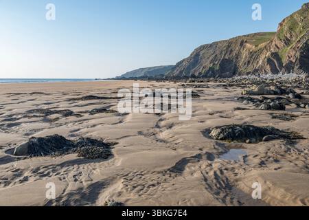 Shadow patterns from evening light on Cornwall beach near Sandymouth Stock Photo