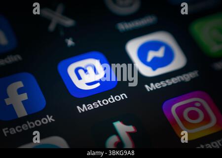 Antalya, Turkey - June 5, 2025: Mastodon App icon among various application icons on smartphone screen Stock Photo