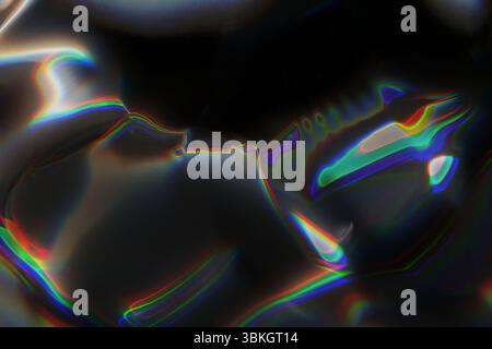 Abstract Iridescent Light Waves on Dark Surface Stock Photo