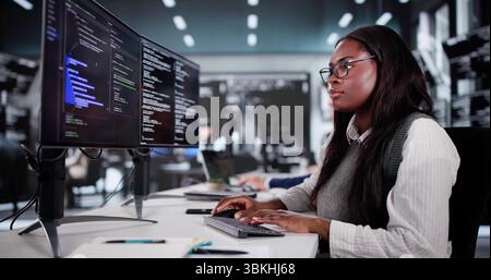 Innovative Tech Team Collaborating To Engineer Computer Solutions For Business. Stock Photo