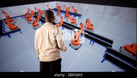 African American Engineer Creating Augmented Reality Factory Layout Mockup Stock Photo