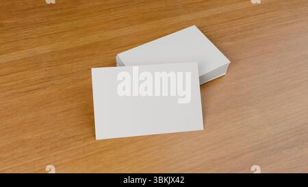 Empty business cards stack, ideal for mockup. Template for branding identity. Isolated over wooden table. Stock Photo