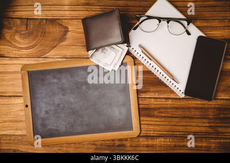 Flat design is showing top-down chalkboard left, wallet, notebook, pencil, eyeglasses, phone Stock Photo