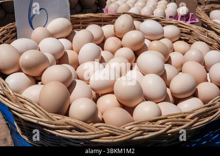 organic eggs in a basket on local street bazaar Stock Photo