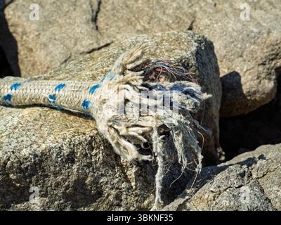 Close-up of frayed boat rope end – nautical detail texture Stock Photo