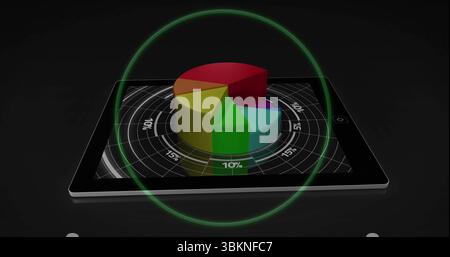 Displaying tablet resting in studio, with colorful 3D pie chart and green glowing ring Stock Photo