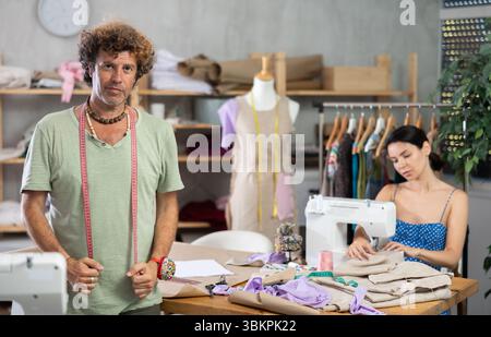 Workflow in tailors workshop, production of clothes Stock Photo