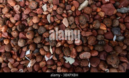 Frame full of decorative brown stones. Texture. Background. Geometry. Stock Photo