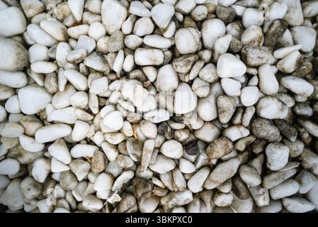Frame full of white decorative stones. Texture. Background. Geometry. Stock Photo