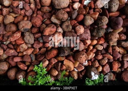 Frame full of decorative brown stones. Texture. Background. Geometry. Stock Photo