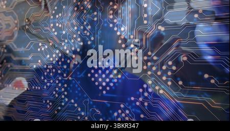 Heating soldering iron, technician attaching solder wire on PCB at bench, with digital overlay Stock Photo