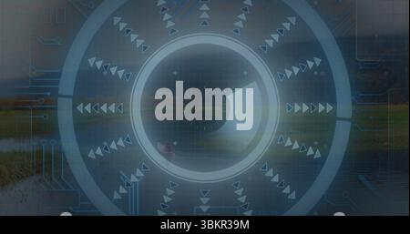 Overlaying circular interface blending into lakeside marsh, with concentric rings and radial arrows Stock Photo