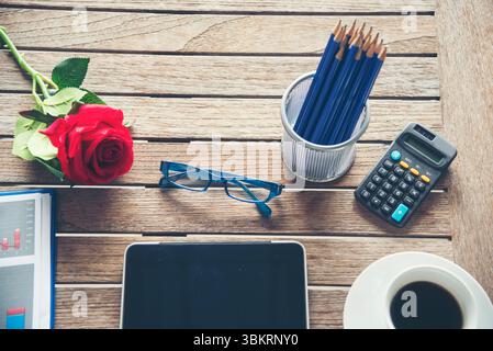 Top view office desk laptop and coffee cup on wood table copy space. Tabletop notebook laptop coffee cup for officer display empty space on wooden bac Stock Photo