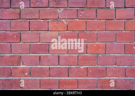 Background made of an old red brick wall Stock Photo