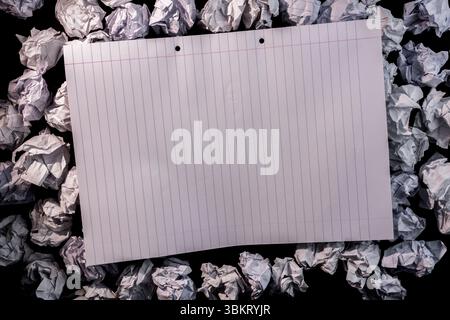 Lined paper notebook on crumpled paper Stock Photo