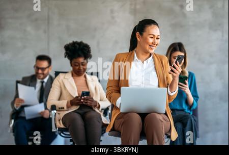 Happy professional business woman company employee, young entrepreneur smiling businesswoman working Stock Photo