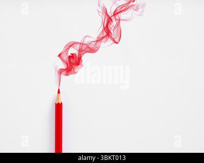 Red colored pencil drawing an abstract red smoke line on a white background, concept of creativity and art Stock Photo