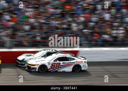 Ryan Preece (60), Brad Keselowski (6), and Chris Buescher (17) break ...