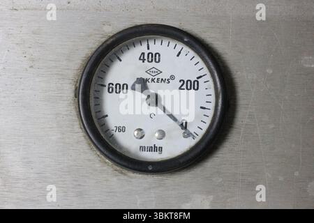 Industrial manufacturing machine showing close up details of its metal ...
