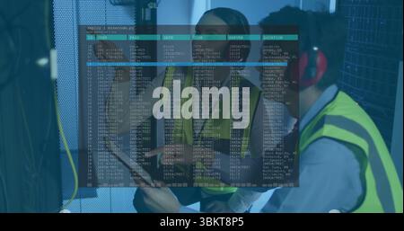 Inspecting technicians wearing hi vis vests checking server cables in server room, with clipboard Stock Photo