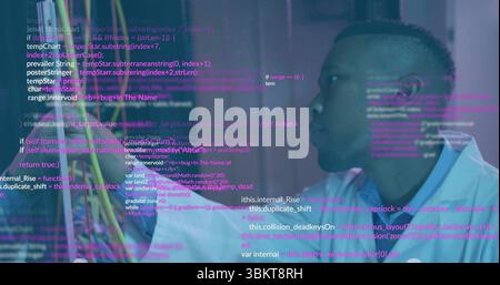 Inspecting scientist in lab coat examining wires on lab bench with code overlay, copy space Stock Photo