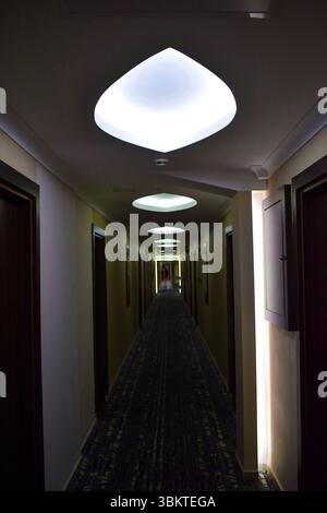 Long Hotel Corridor with Modern Lighting in Turkey Stock Photo
