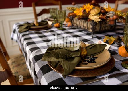Thanksgiving table ready for celebrating with family with autumn decor Stock Photo