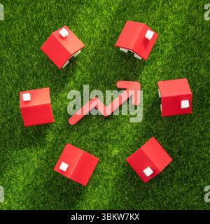 Houses on the grass and a red arrow pointing up. Rising housing prices, market growth, or increased demand for suburban living. Real estate appreciati Stock Photo