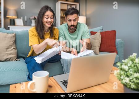 Successful young business people working together in home office. Freelance couple teamwork businessman and businesswoman startup concept video call p Stock Photo