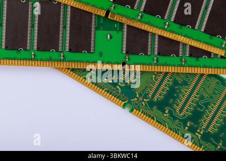 Various circuit boards with memory RAM modules chips are arranged neatly, intricate connections components. Stock Photo