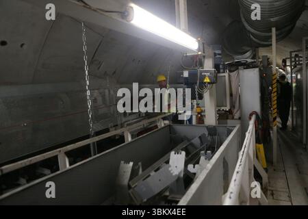 Construction on Athens Metro Line 4 .Tunnel boring machine (TBM) currently in Galatsi, has completed nearly 1.400 meters of its corresponding tunnel and is expected to reach Evangelismos by the end of 2026. The 1.5 billion project, Greece's largest ongoing public works initiative, will add 15 underground stations spanning 13 kilometers: Alsos Veikou, Galatsi, Elikonas, Kypseli, Dikastiria, Alexandras, Exarchia, Akadimia, Kolonaki, Evangelismos, Kaisariani, Panepistimioupoli, Ilissia, Zografou, and Goudi. The contractual timeline for completion is eight years from the signing of the concession. Stock Photo