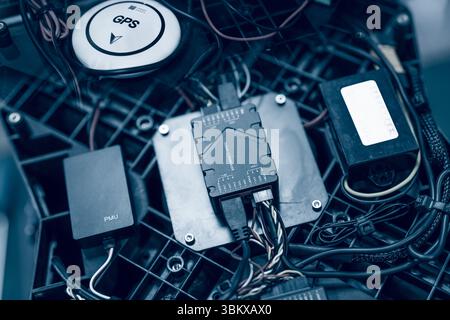 Agricultural drone flight control electronics. Power management unit and GPS module. Precision crop monitoring and automation. PMU and GPS navigation Stock Photo