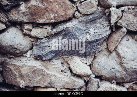 Texture of a massive Greek stone with various shades in Crete Stock Photo