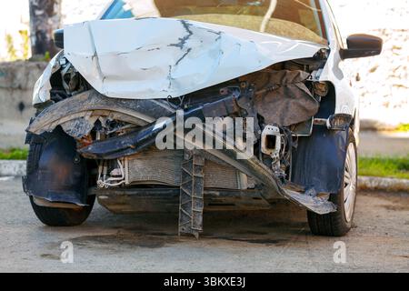 Close-up of a damaged car after an accident on the road Stock Photo