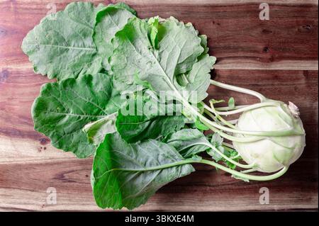 White kohlrabi on a wood cutting board Stock Photo