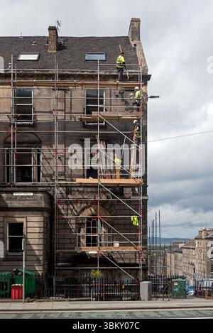 Scaffolding being erected in Queen Street in Edinburgh's New Town. Stock Photo