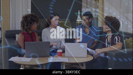Discussing goals, four professionals collaborating in office lounge, with laptops documents coffee Stock Photo