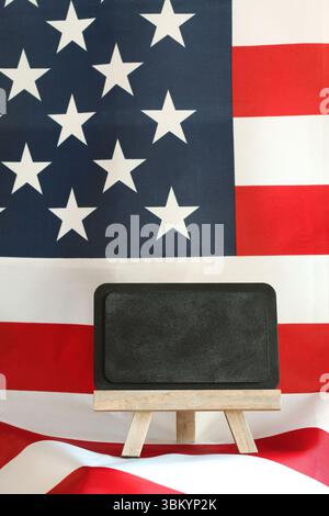 Blank Chalkboard with American Flag Background for Independence Day Message or Holiday Design Stock Photo