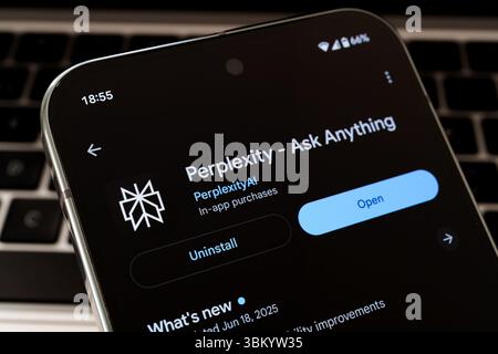 Perplexity AI app open in Google Play Store on smartphone screen with visible update info. Stafford, United Kingdom, June 23, 2025 Stock Photo